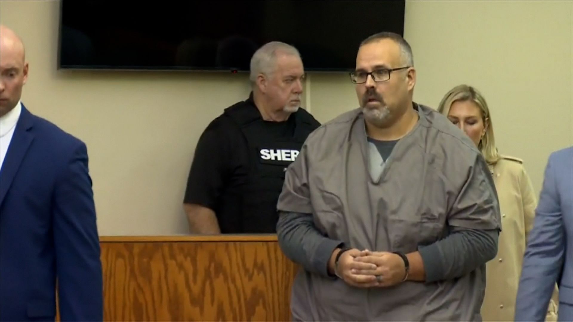 Former Kentucky sheriff pleads not guilty in the fatal courthouse shooting of a judge