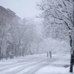 Great Lakes region gets yet more snow after a weekend of snarled Thanksgiving travel