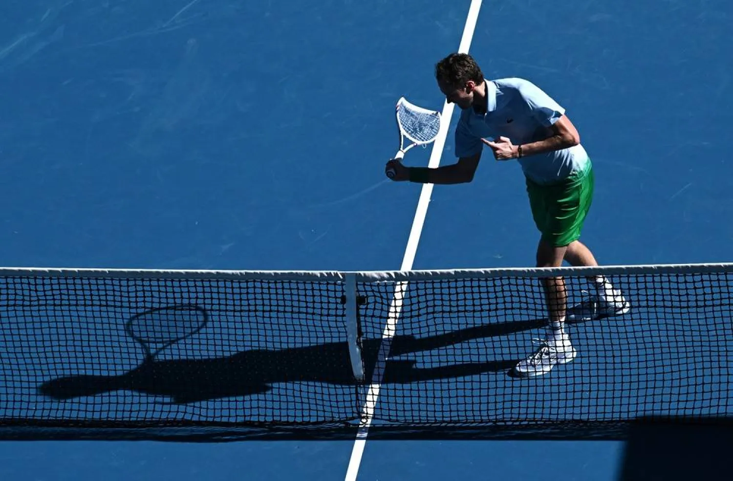 Daniil Medvedev loses his cool and smashes a net camera during hard-fought win at the Australian Open